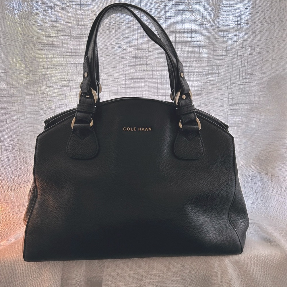 small vintage Cole Haan bag. Two compartments and one inner zippered pocket
